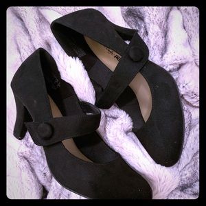 Small black strap pumps